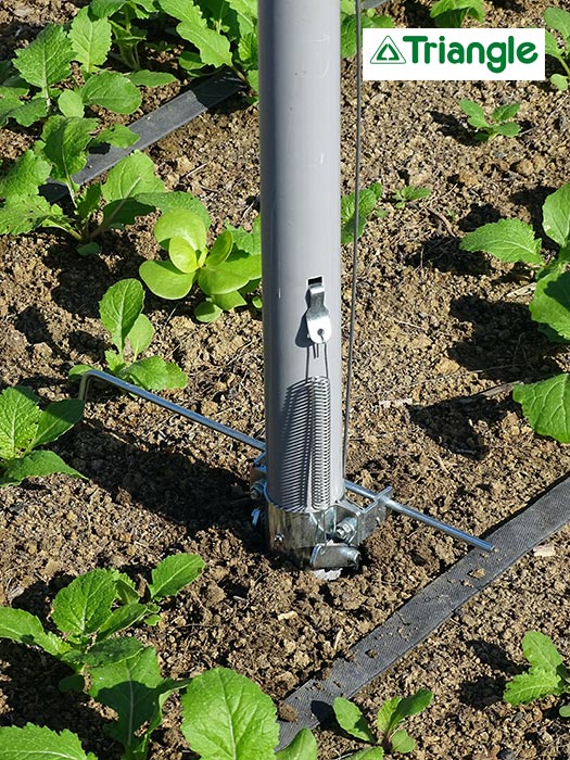 Bec en acier planté en terre